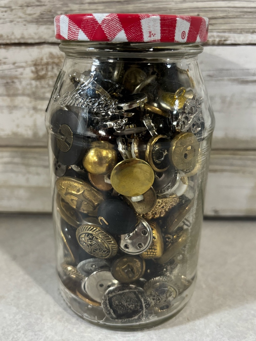 Jam jar full of buttons.